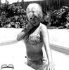 Jayne Mansfield wearing a polka dot bikini in a swimming pool Photo Print (8 x 10)
