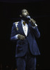 Marvin Gaye performing on stage wearing a blue suit Photo Print - Item # VARGLP360877