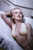 Marilyn Monroe lying down wearing a bikini Photo Print (8 x 10)
