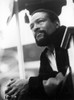 Marvin Gaye sitting outdoors Photo Print (8 x 10)