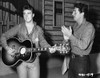 Dean Martin and Ricky Nelson on the set of Rio Bravo Photo Print - Item # VARGLP380696