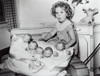 Shirley Temple playing with baby dolls Photo Print - Item # VARGLP382925