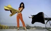 Raquel Welch bull fighting Photo Print - Item # VARGLP387133