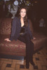 Hunter Tylo In Black Sitting On Couch Photo Print - Item # CPA2960