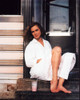 Kathleen Turner Sitting On Steps Photo Print