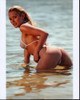 Nicky Whelan In Water Looking Over Shoulder Photo Print
