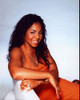 Ashanti Sitting In Orange Dress Photo Print