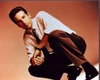 David Duchovny Crouching In Brown Pants Photo Print