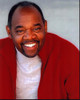 Gregg Daniel Smiling In Red Sweater Photo Print
