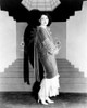 Clara Bow Modeling An Evening Wrap Of Chiffon Velvet Over A Chiffon Evening Gown Ca. 1927 Photo Print - Item # VAREVCPBDCLBOEC085H