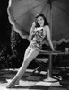 Ann Miller Eating Ice Cream Ca. 1941 Photo Print - Item # VAREVCPBDANMIEC055H