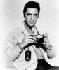 Live A Little Love A Little Elvis Presley Poses With His Leica Camera 1968. Photo Print - Item # VAREVCMBDLIALEC005H