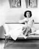 Kay Francis Modeling White Crepe Lounging Pajamas With A Paisley Sash Ca. Mid-1930S Photo Print - Item # VAREVCPBDKAFREC080H