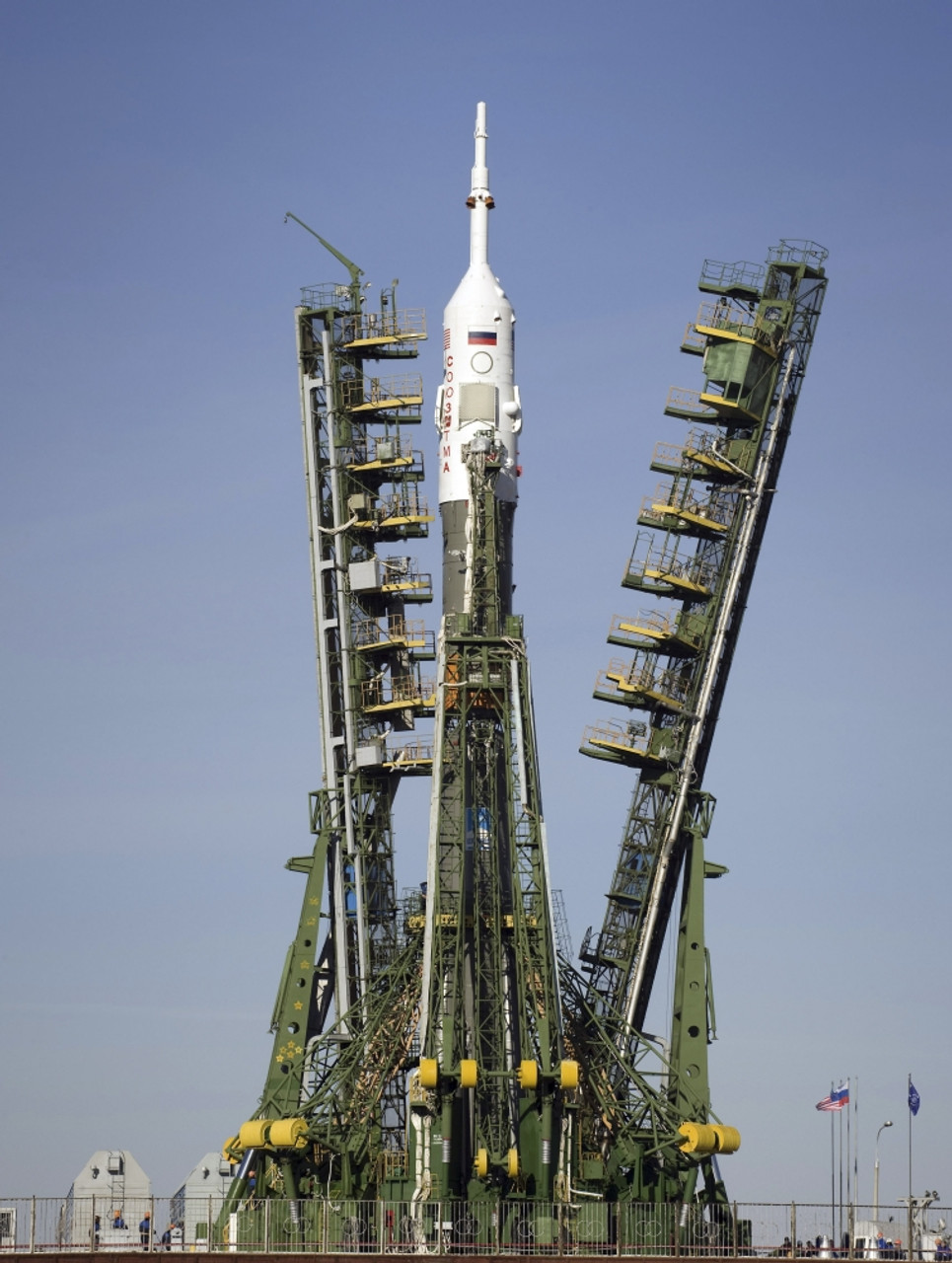 sin Injustice parade March 24, 2009 - The Soyuz rocket is erected into position at the launch pad  at the Baikonur Cosmodrome in Kazakhstan. Poster Print - Item #  VARPSTSTK202563S - Posterazzi