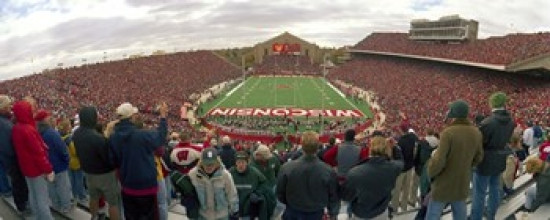 Watching Football Match In Stadium Dad And Son Watching Football