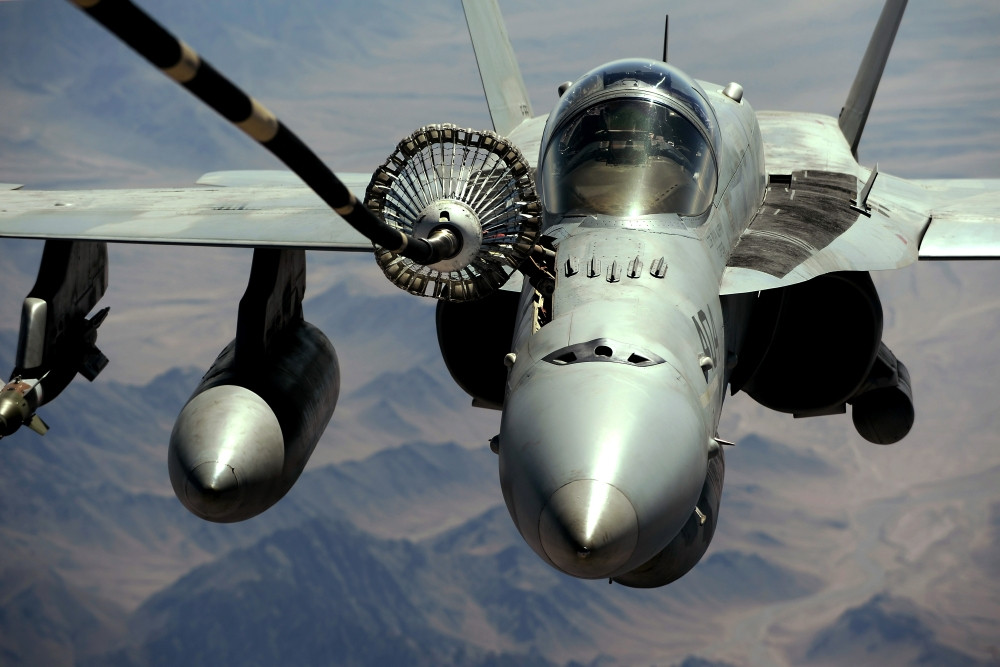 June 17, 2009 - A U.S. Navy F/A-18C Hornet receives fuel from the
