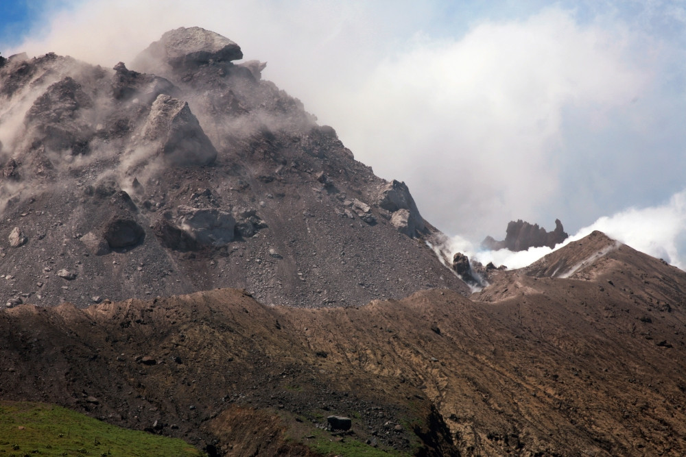 March 2006 - Ash and gas rising from lava dome of Soufriere Hills
