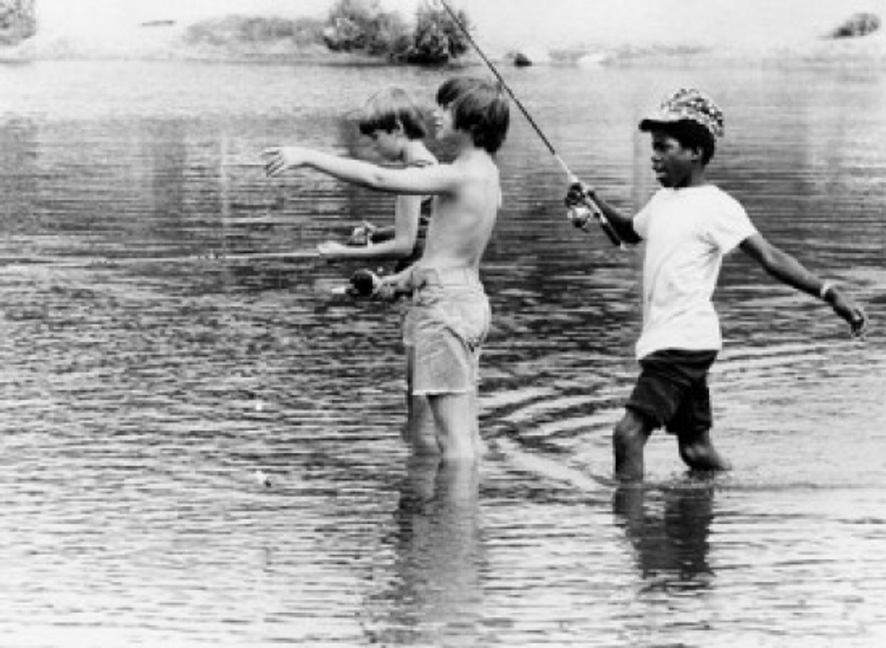 Premium Photo  Three boys fishing in the river,Boys in a straw