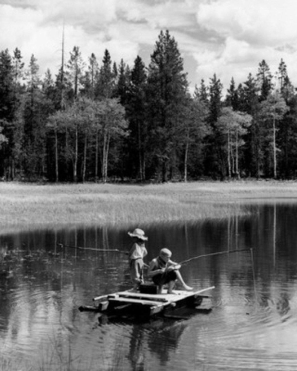 Vintage photograph of boy and girl sitting on wooden raft fly-fishing with  improvised fishing rods on lake Poster Print - Item # VARSAL25516349 -  Posterazzi