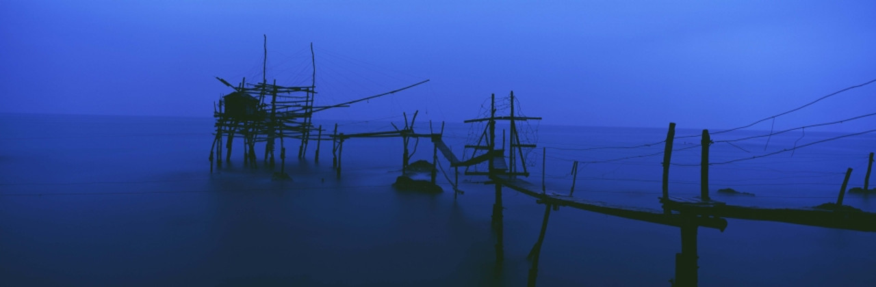 Old Fishing Platform Over Water At Dusk PosterPrint - Item