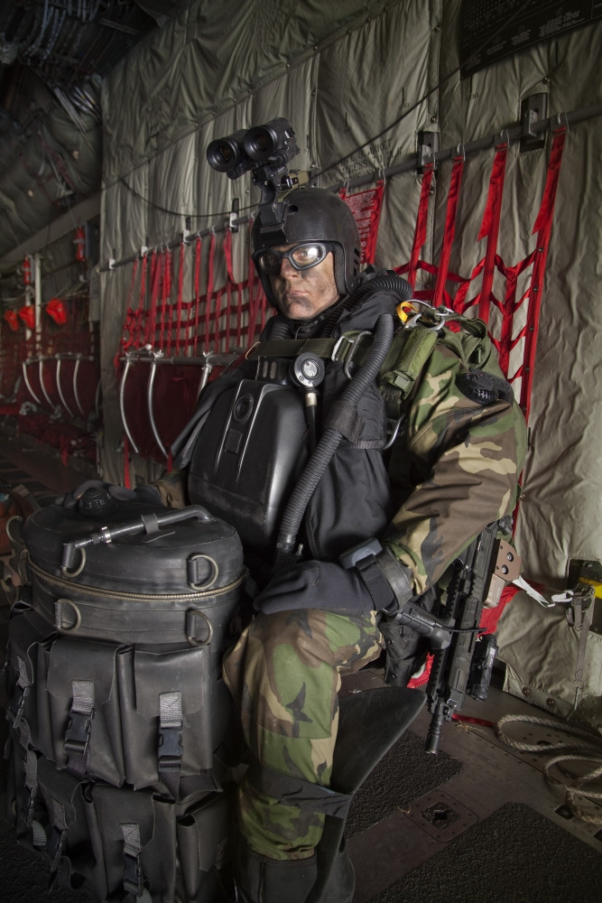 U.S. Navy Seal combat diver prepares for HALO jump operations from