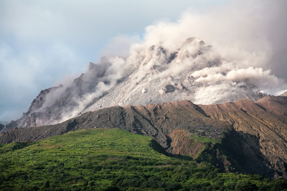 March 2006 - Ash and gas rising from lava dome of Soufriere Hills