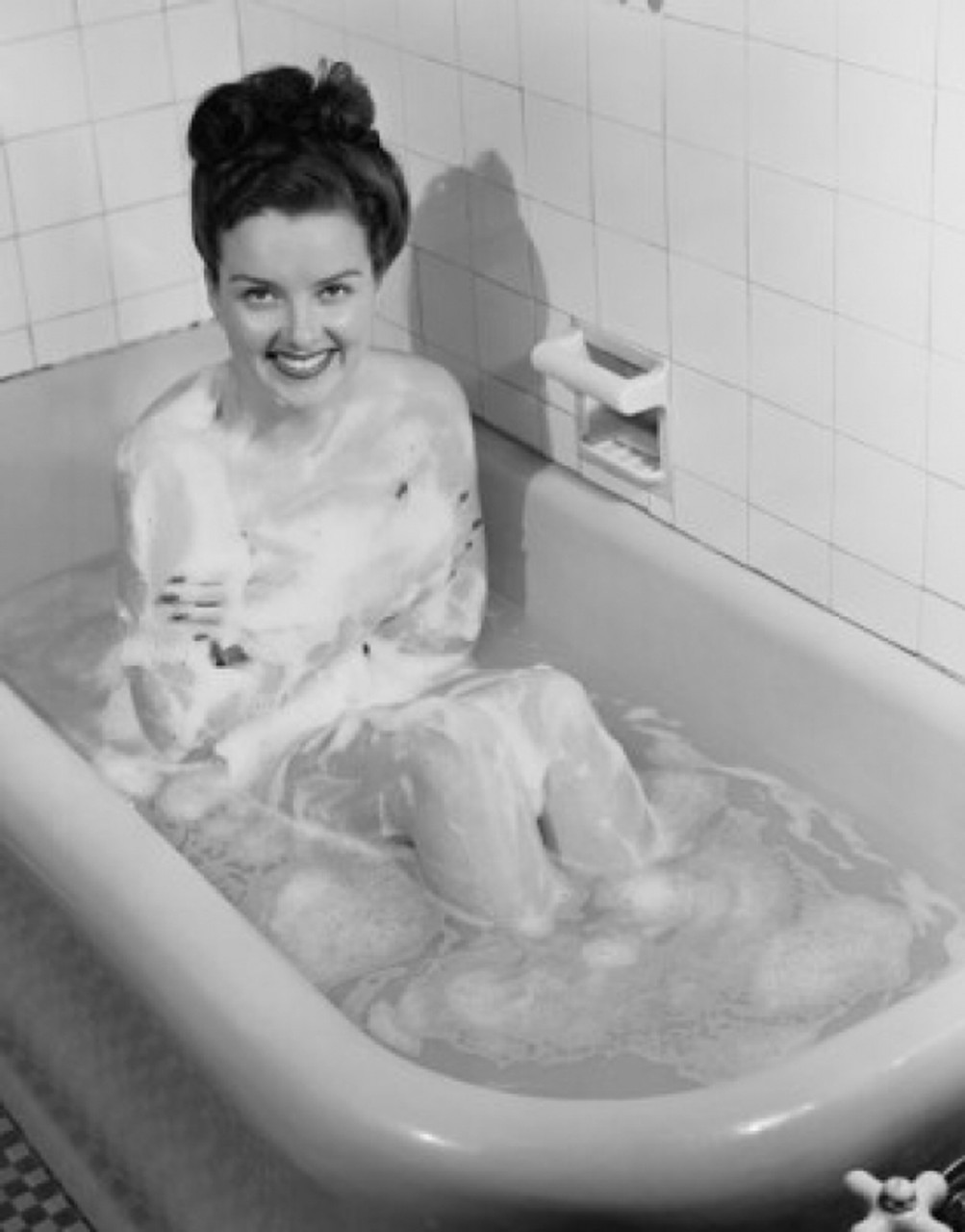 Young woman taking bath Poster Print - Item # VARSAL255418730