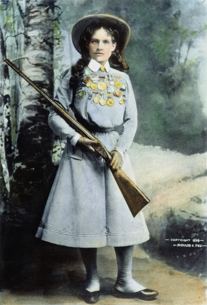 Annie Oakley (1860-1926). /Noil Over A Photograph, 1899. Poster