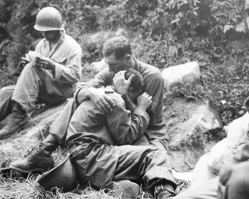 Korean War, 1950. /Nan American Infantryman Comforted By A Comrade