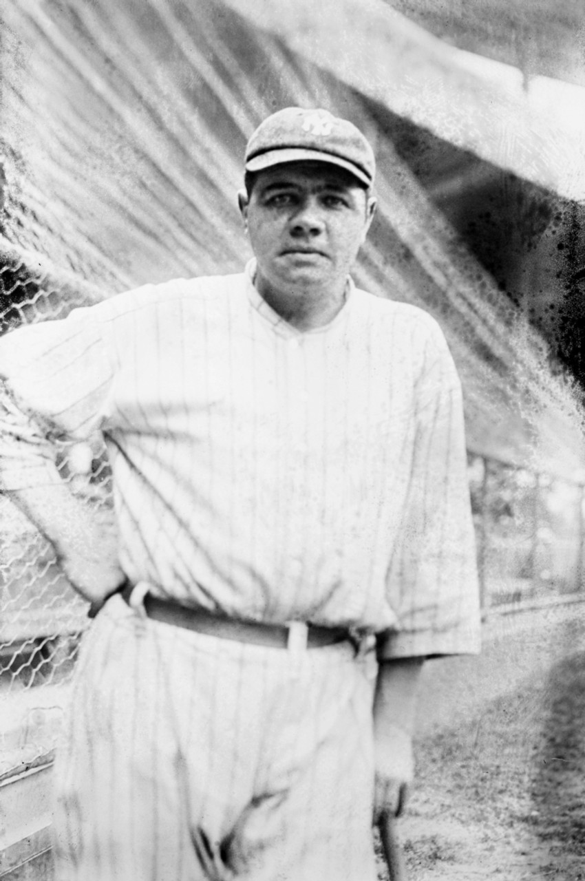 BABE RUTH (1895-1948) American baseball player while playing his