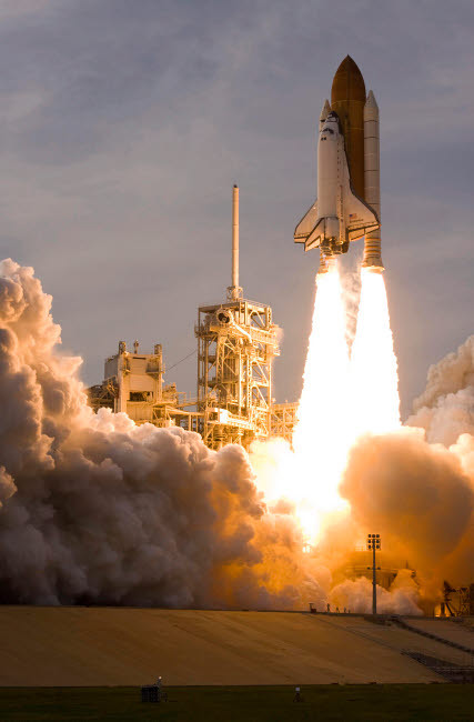 Space Shuttle Endeavour lifts off from its launch pad at Kennedy