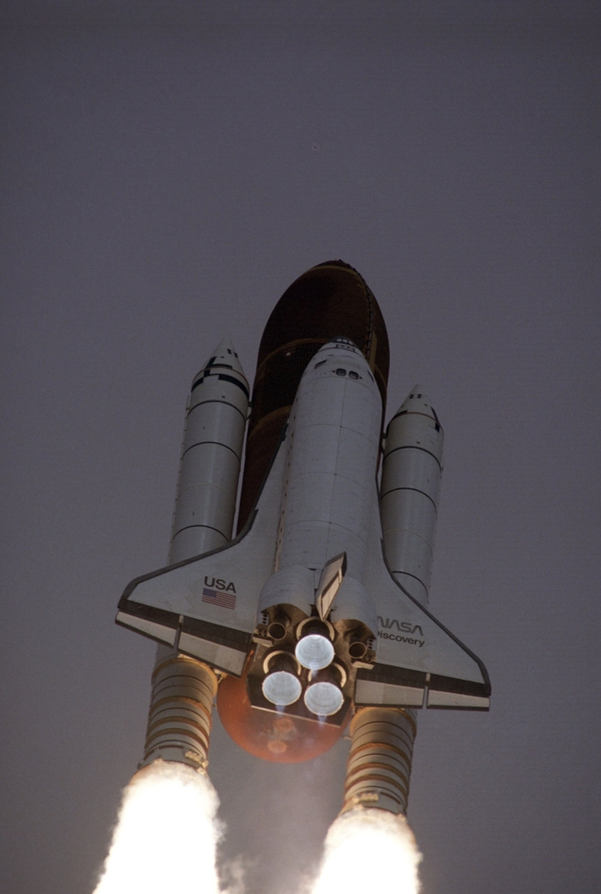 space shuttle through telescope