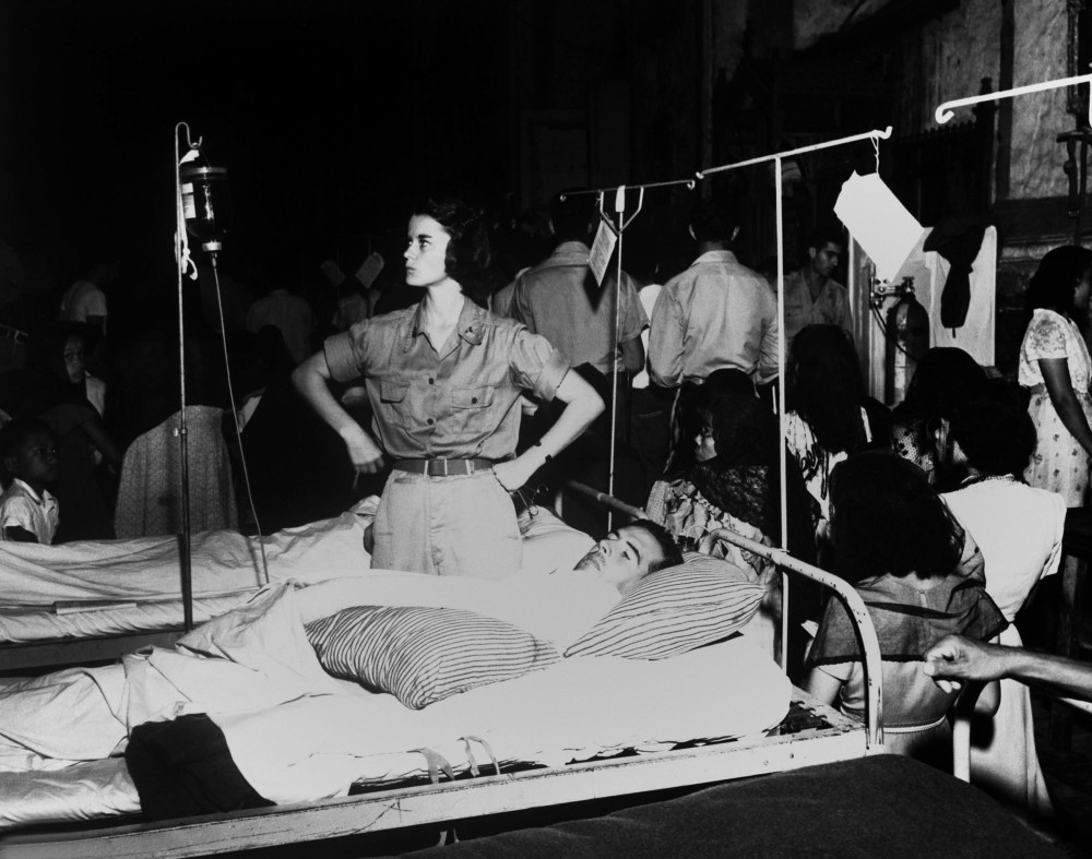 Army Nurse Checks A Soldier'S Glucose Drip In The 36Th Evacuation ...