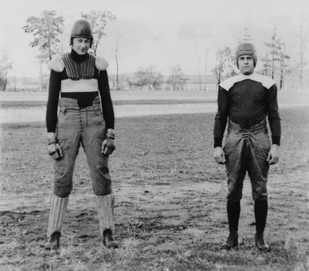 Notre Dame University Football Players Wearing Old And New Football
