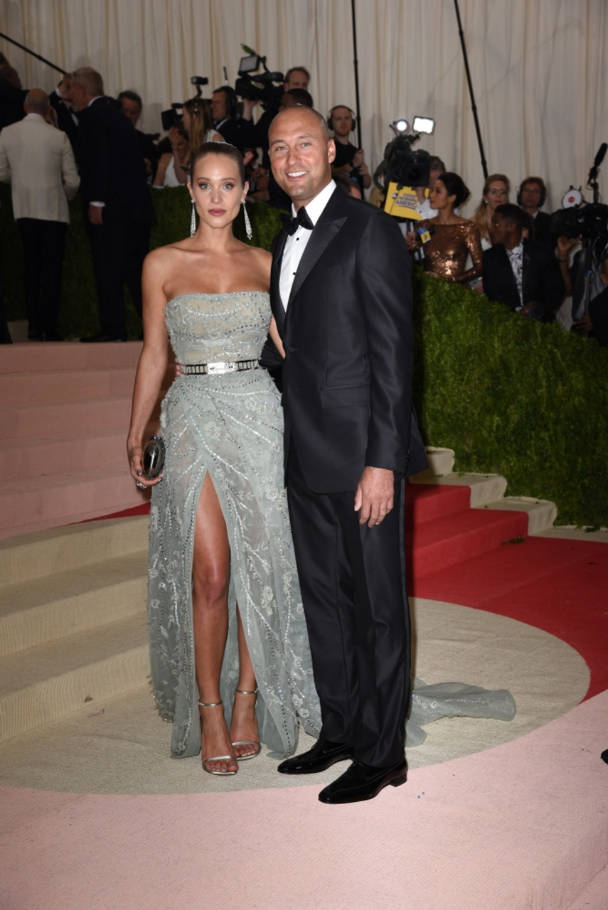 Hannah Davis and Derek Jeter attend the Manus x Machina: Fashion in an Age  of Technology Costume Institute Benefit Gala at Metropolitan Museum of Art  on May 2, 2016 in New York