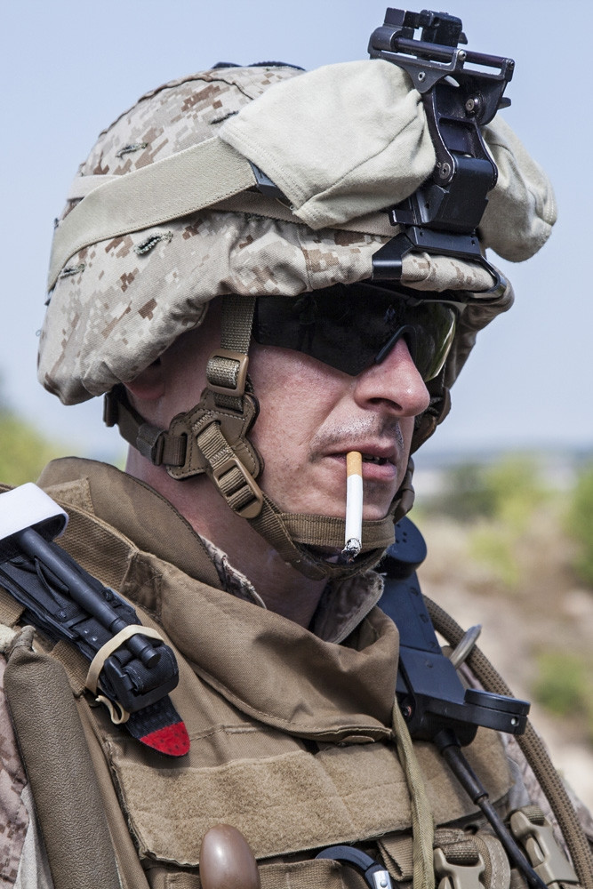 marine smoking cigarette U.S. Marine smoking a cigarette, half-turned to the camera. Poster Print by  Oleg Zabielin/Stocktrek Images - Item # VARPSTZAB100234M