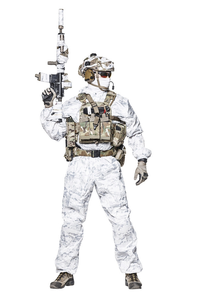 Special forces operator of Navy Seals armed with assault rifle
