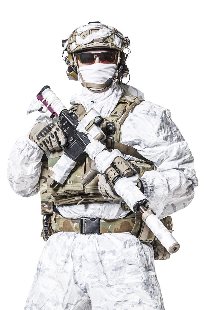 Special forces operator of Navy Seals armed with assault rifle