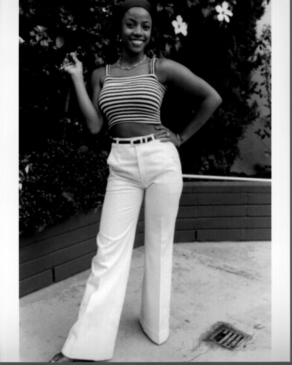 Bern Nadette Stanis In Striped Top And White Pants Black And White
