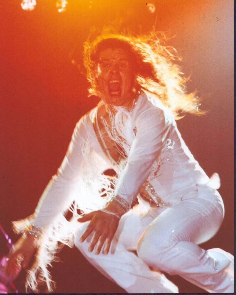 Ozzy Osbourne In White Outfit Jumping Photo Print (8 x 10) - Posterazzi