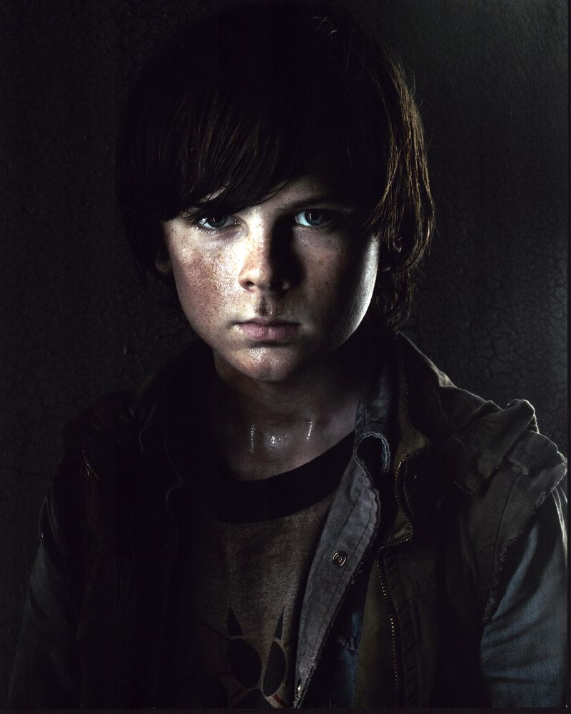 Chandler Riggs In Cargo Vest For The Walking Dead Photo Print 8 X 10 chandler-riggs-in-cargo-vest-for-the-walking-dead-photo-print-8-x-10