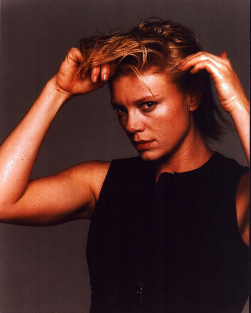 Peta Wilson In Black Top With Hands In Hair Photo Print (8 x 10