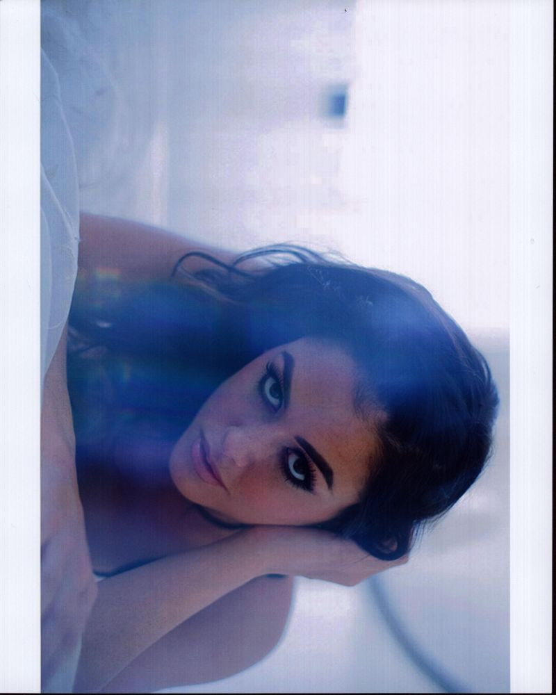 Jenna Chapple Laying On Bed Photo Print - Item # MVM58693 - Posterazzi