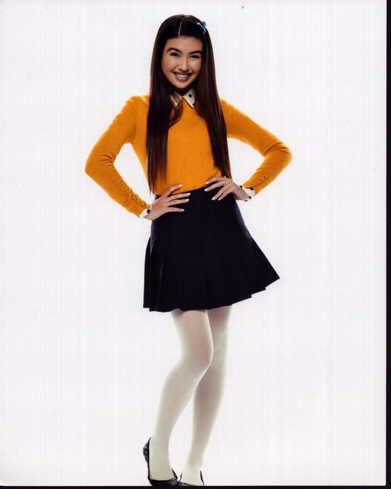 yellow top and black skirt