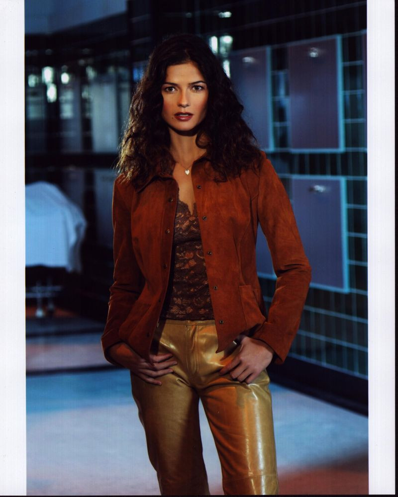 Jill Hennessy In Orange Jacket And Gold Pants For Crossing Jordan