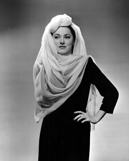 Eleanor Parker Wearing A Turban And Scarf Treatment Made Of Chiffon Designed By Leah Barnes 1943. Photo Print - Item # VAREVCPBDELPAEC013H