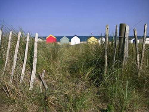 Beach huts in a row Poster Print by  Assaf Frank - Item # VARPDXAF20090616227C04