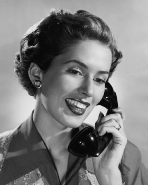 Close-up of a young woman talking on the telephone Poster Print - Item # VARSAL2559293