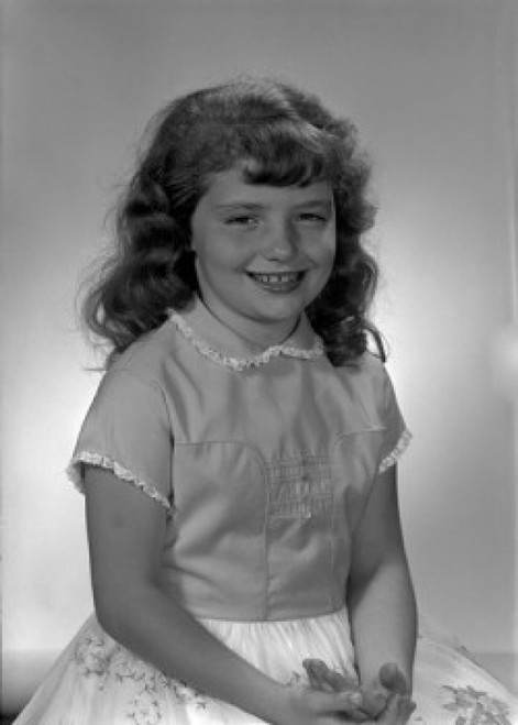 Studio portrait of girl wearing dress Poster Print - Item # VARSAL25514005