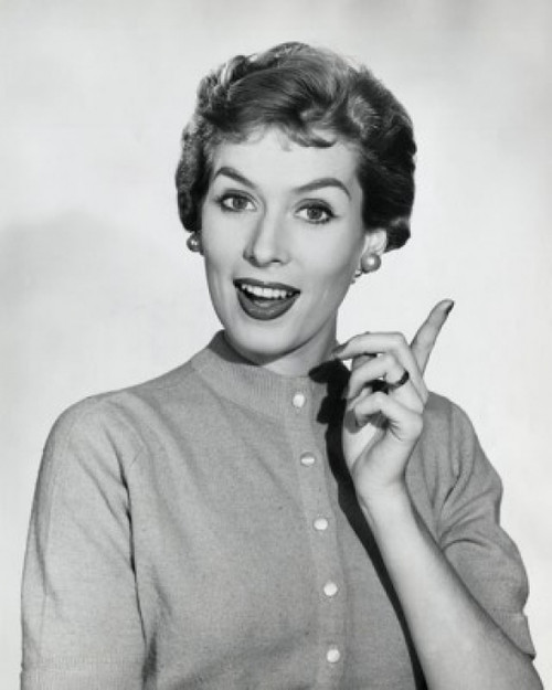 Studio portrait of young woman gesturing Poster Print - Item # VARSAL25511199
